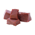 Four pieces of beef liver on a white background