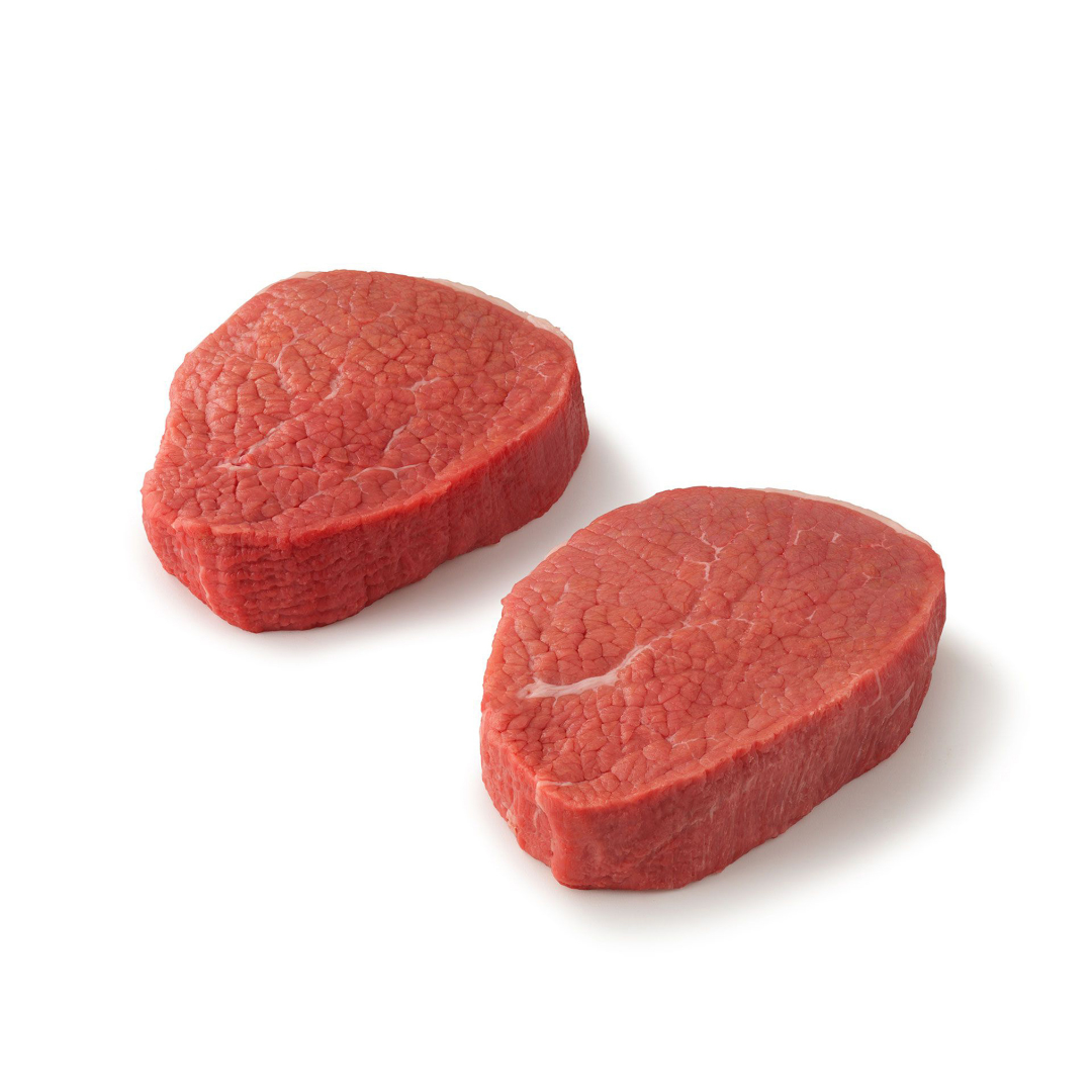 2 eye of round steaks on a white background
