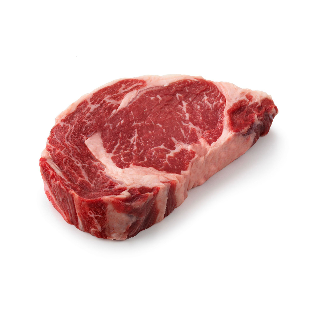 Rib eye steak on a white background