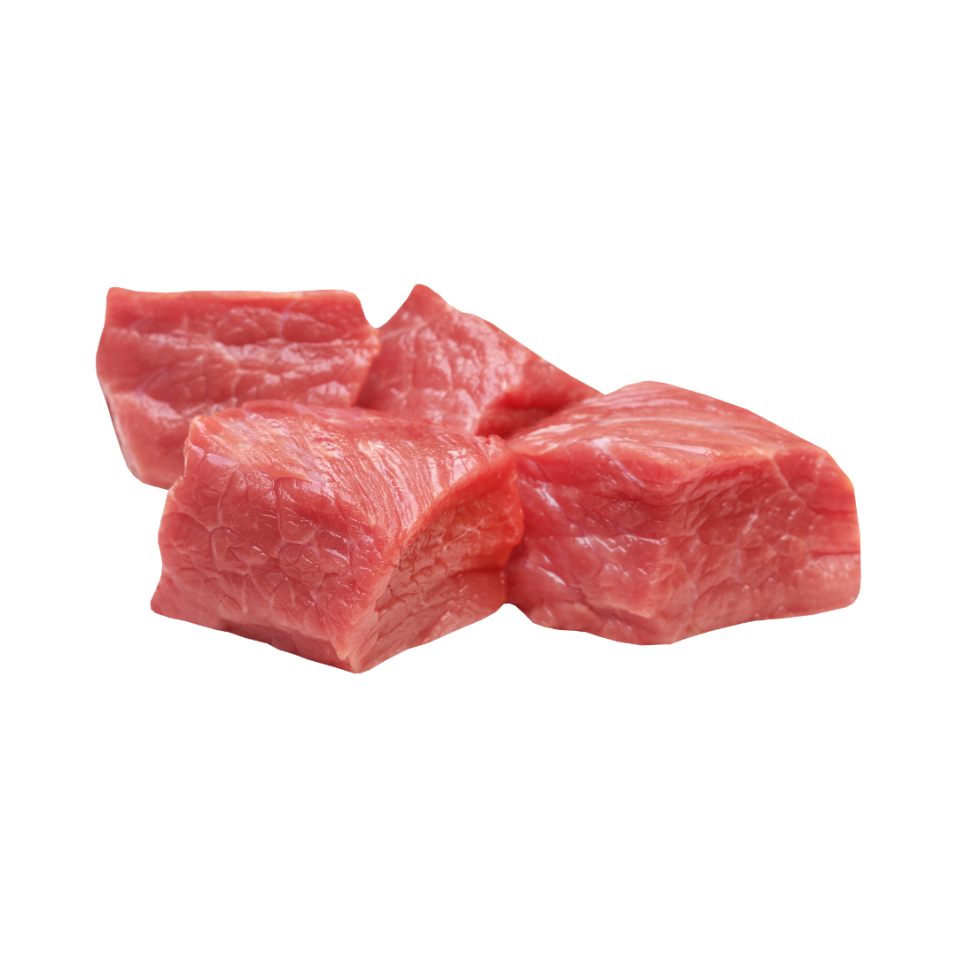 Raw beef chunks on a white background