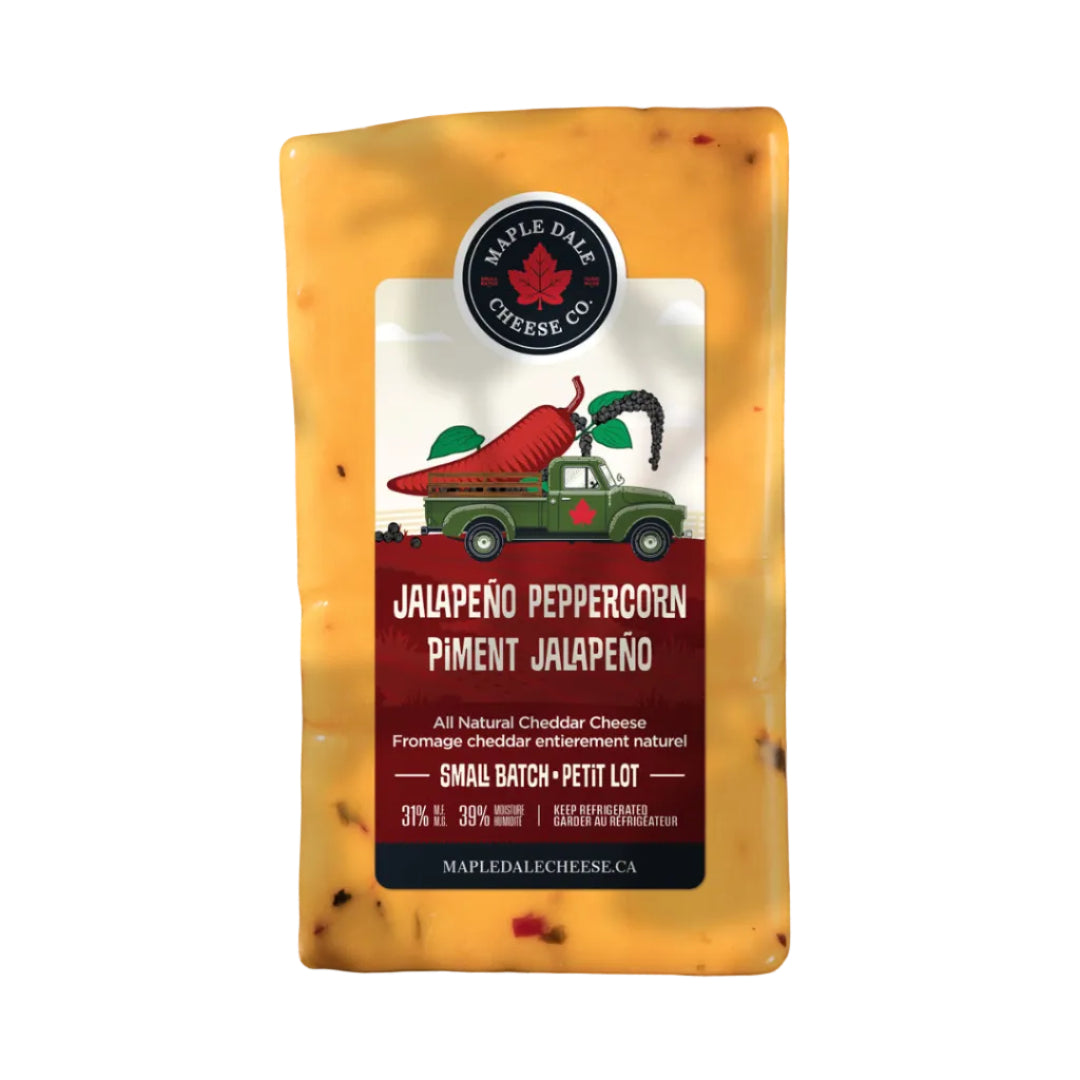 Packaged cheese with a label on a wooden surface