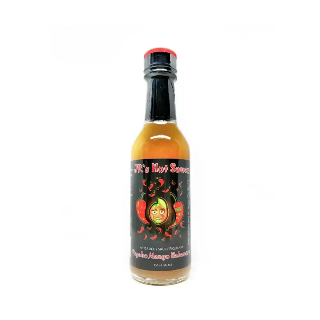 Bottle of spicy sauce with a colorful label on a white background