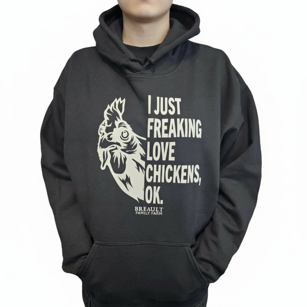 Black hoodie with a graphic of a rooster and text on a white background