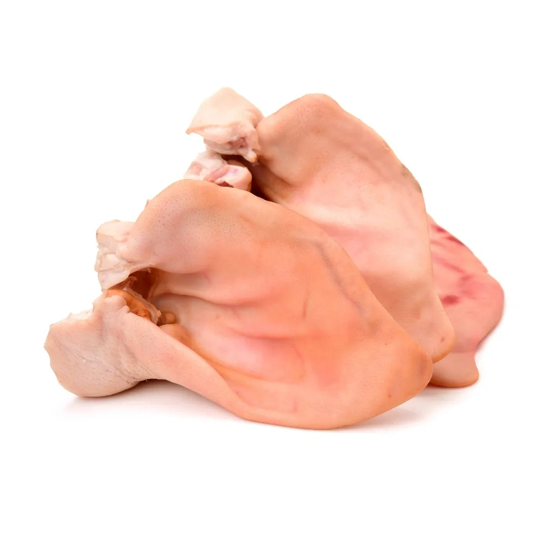 Raw pork organs on a white background