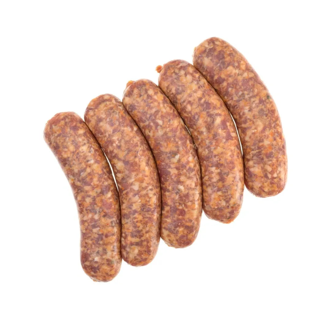 Five raw bison sausages on a white background