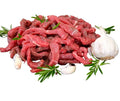 raw bison stir-fry strips on a white background